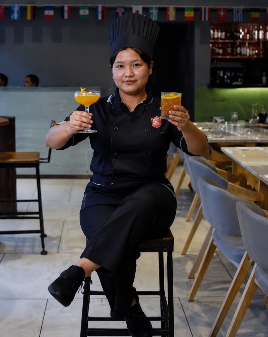 Swaad Gully bartender with signature cocktails